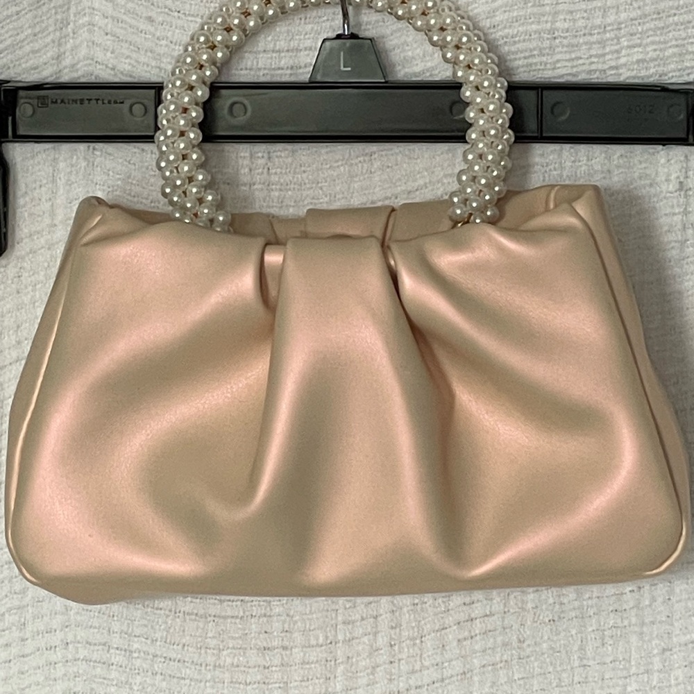 Elegant Pearl Handle Pink Clutch